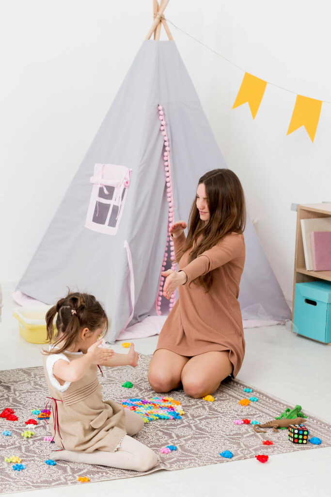 women man playing with children home